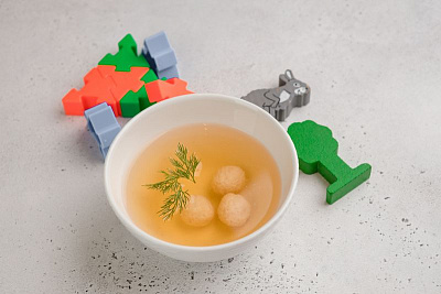 Chicken broth with meatballs